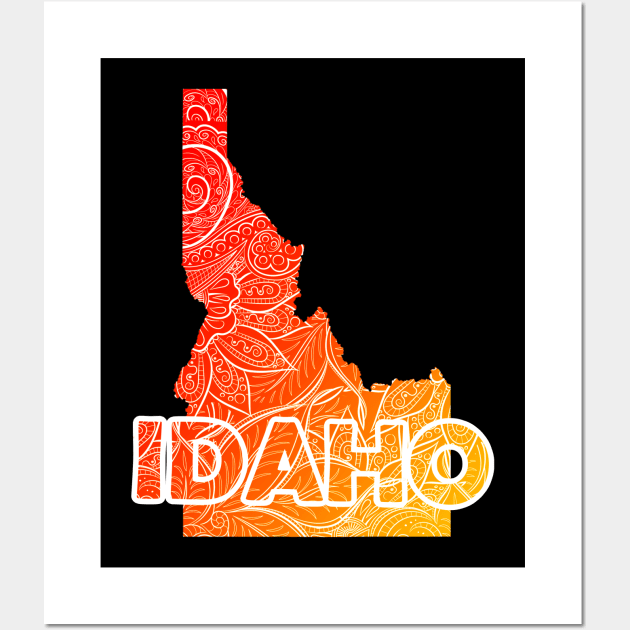Colorful mandala art map of Idaho with text in red and orange Wall Art by Happy Citizen